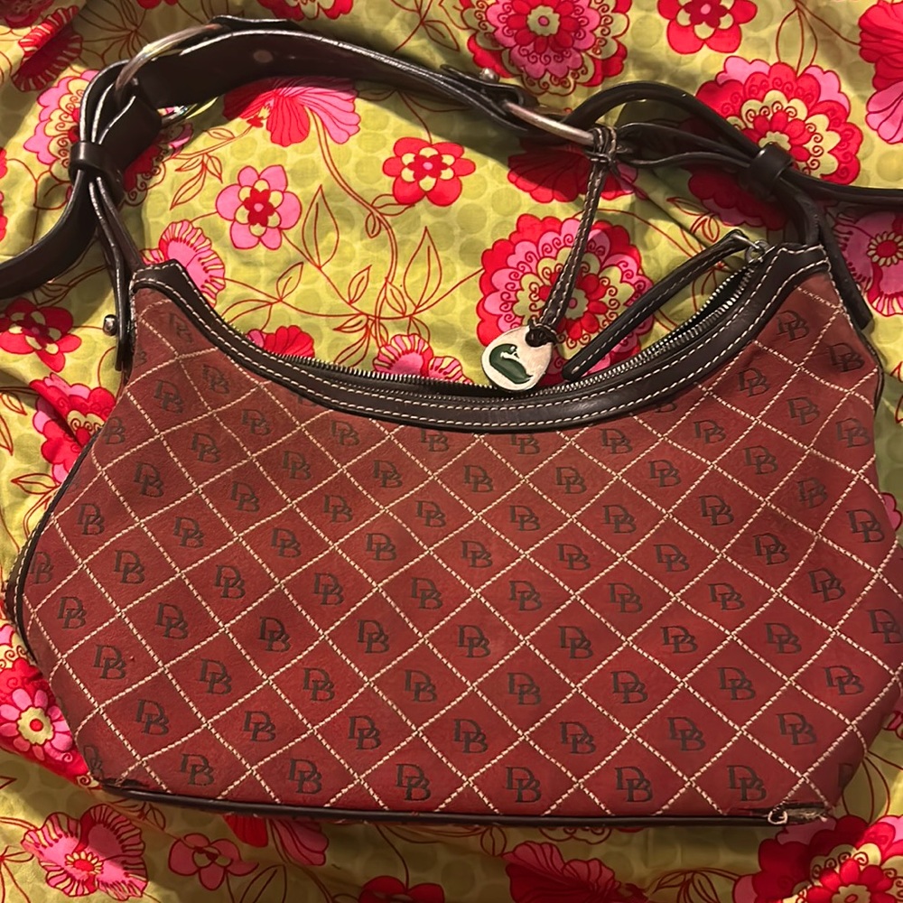 This is an Authentic Dooney and Bourke handbag.